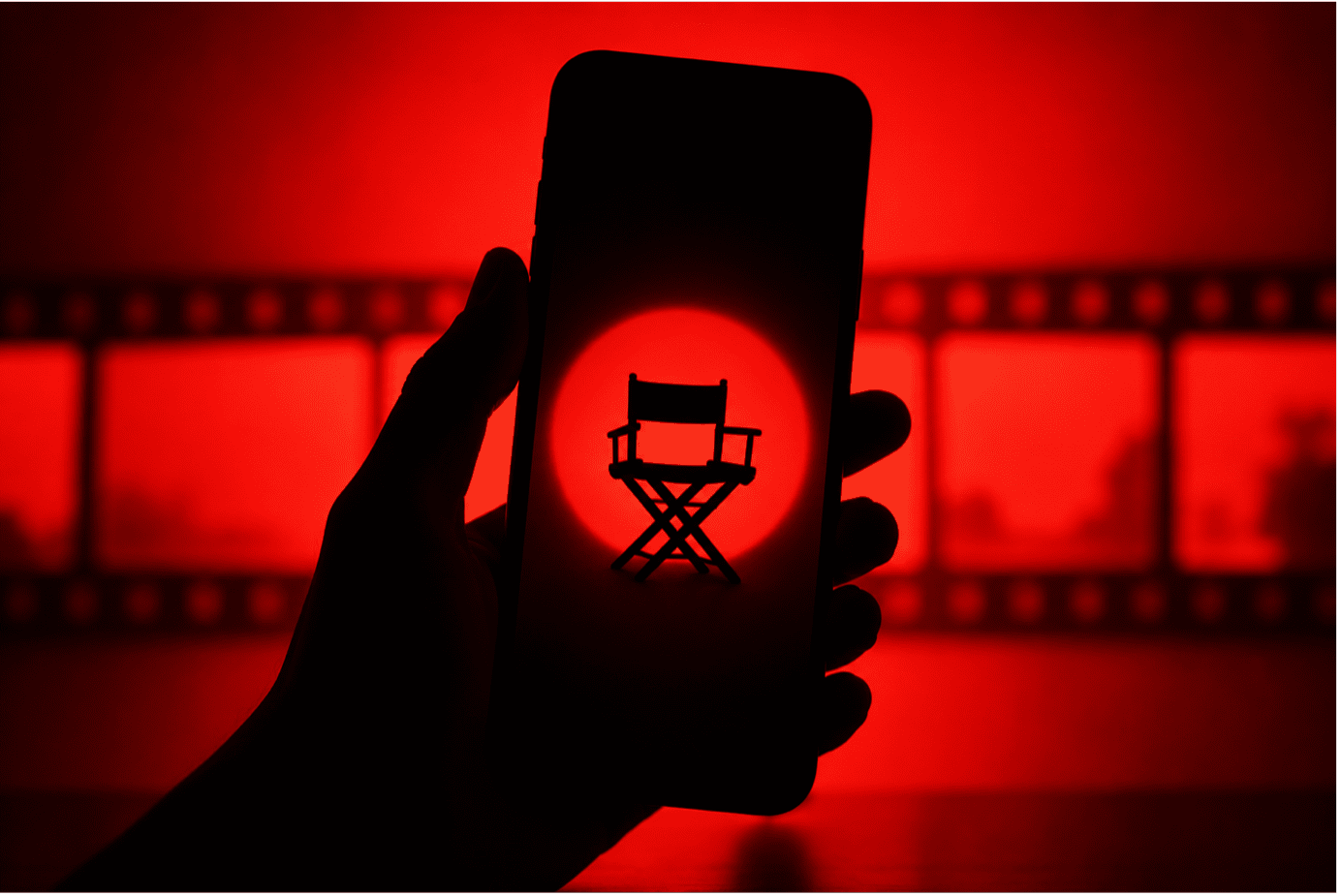 a director's chair, framed on a phone screen